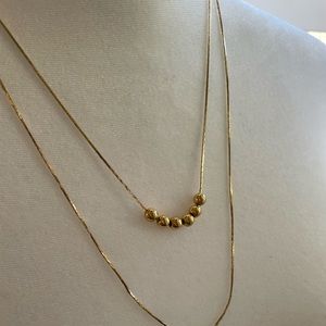 Double strand gold necklace